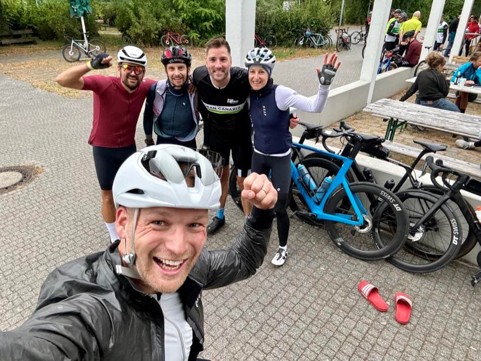 Coffee-stop fist bump on a group ride