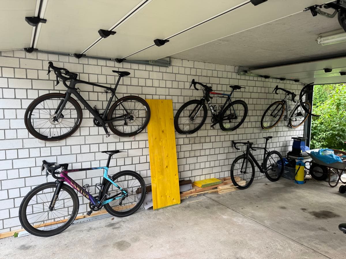 The bikes, hung on the garage wall at home